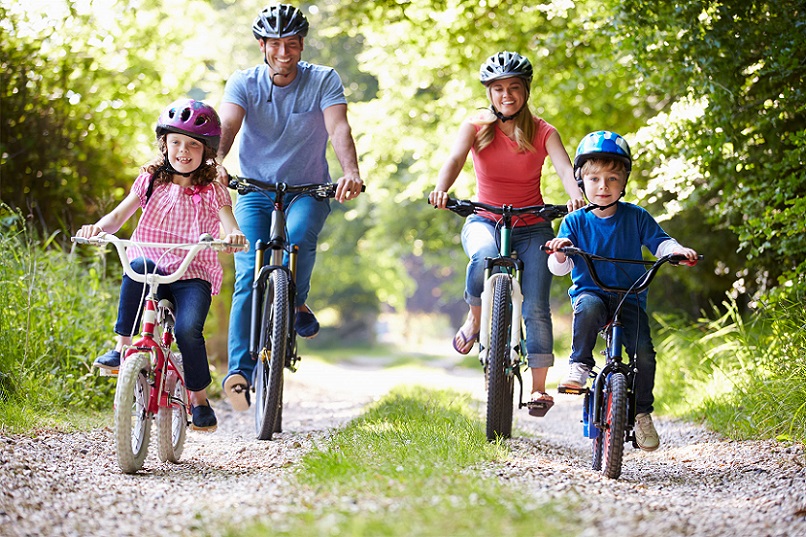 family riding their bikes