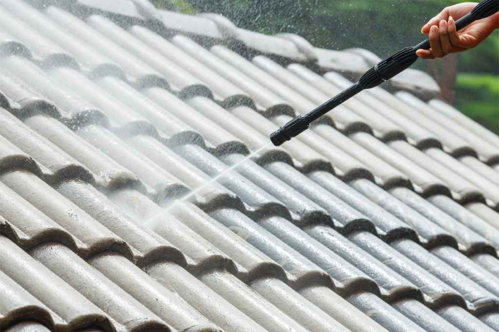 roof being pressure washed